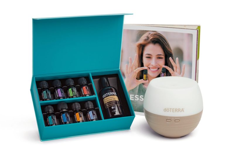 Aromatherapie-Set mit ätherischen Ölen und Diffuser in einer farbigen Box.